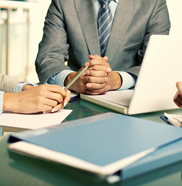 Professional reviewing procurement documents